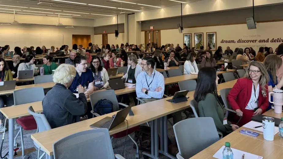Attendees networking at FDA Symposium 