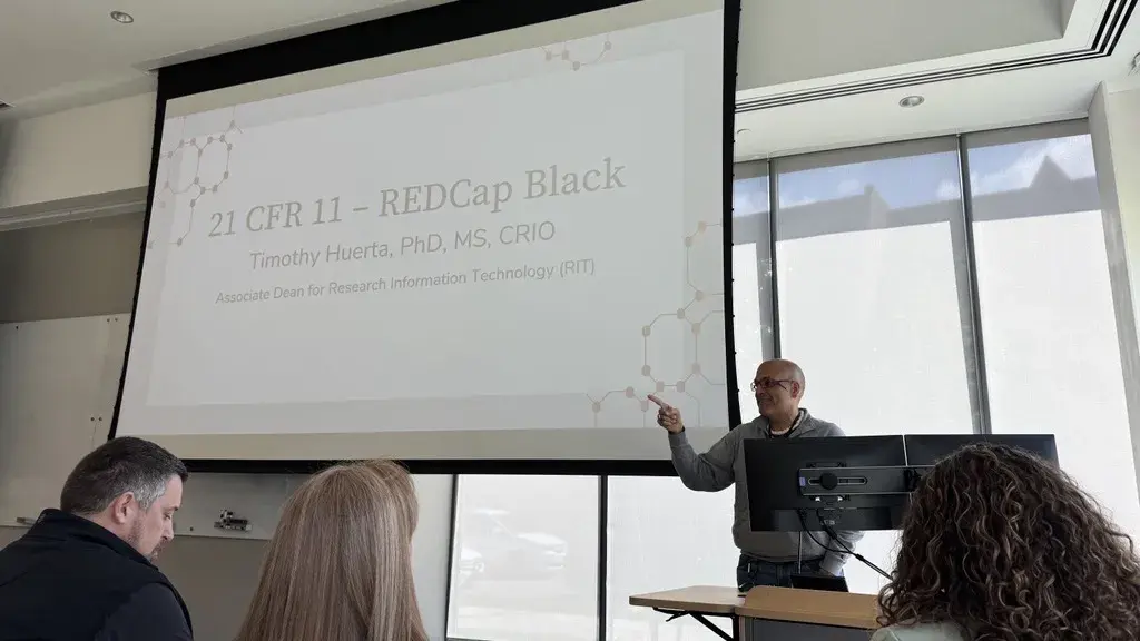 Dr. Timothy Huerta presenting